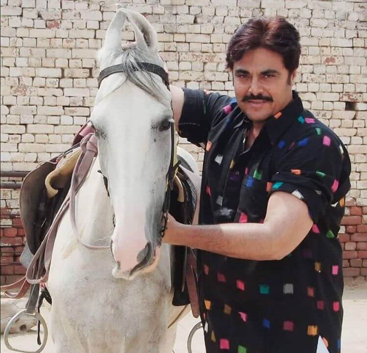 Guggu Gill With His Horse